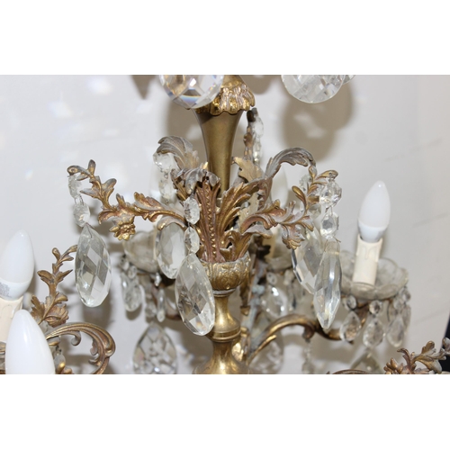 248 - A large and heavy vintage crystal and gilt metal 3 branch chandelier, each branch splitting into 3 t... 