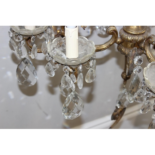 248 - A large and heavy vintage crystal and gilt metal 3 branch chandelier, each branch splitting into 3 t... 