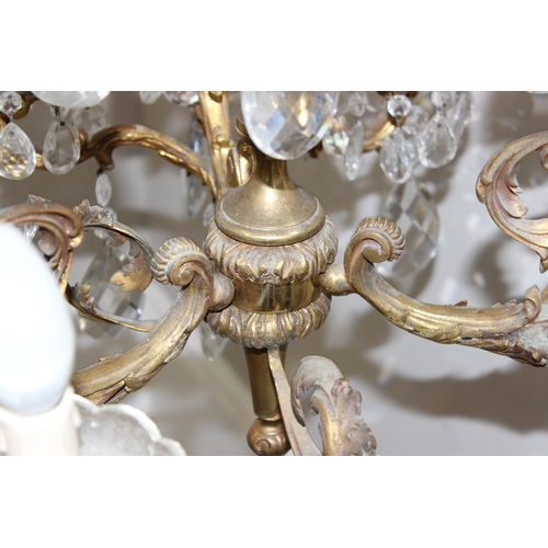 248 - A large and heavy vintage crystal and gilt metal 3 branch chandelier, each branch splitting into 3 t... 