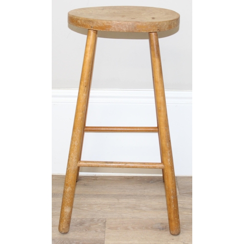 115 - A rustic style light elm stool made by Chris Preston & a further vintage oval topped lightwood stool... 