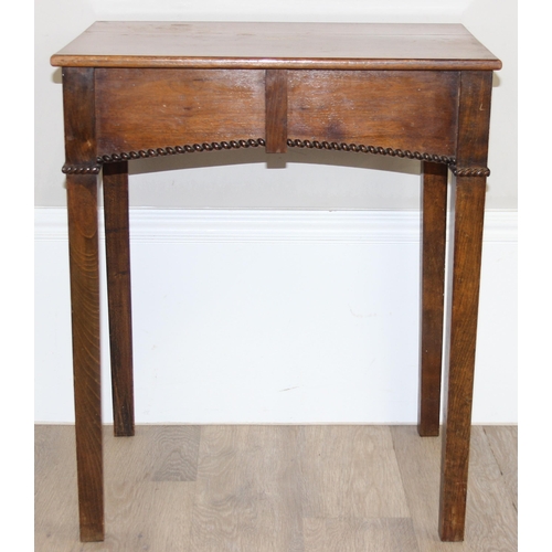 31 - An Edwardian Sheraton style mahogany side table with transfer printed roundel to top and rope twist ... 