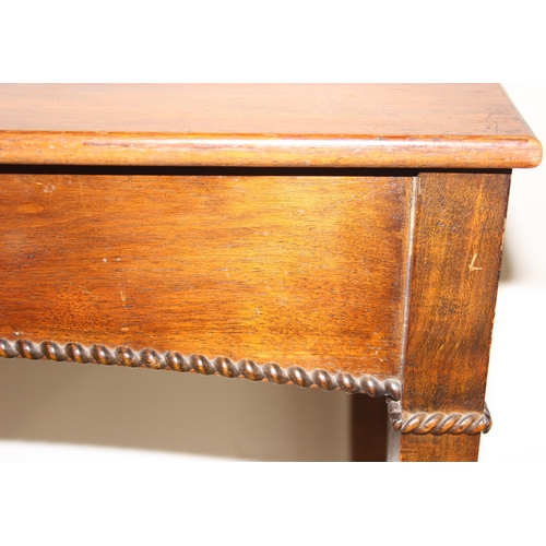 31 - An Edwardian Sheraton style mahogany side table with transfer printed roundel to top and rope twist ... 