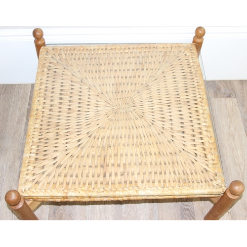 133 - A retro style X-framed light oak based coffee table with woven reed and glass top, approx 70cm squar... 