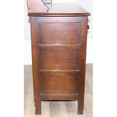 58 - A vintage oak dresser or sideboard, likely Ercol or Old Charm but seemingly unmarked, approx 123cm w... 