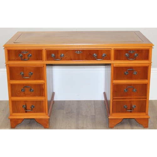 30 - A modern Yew wood effect oak pedestal 3 part desk with inset leather top, approx 122cm wide x 61cm d... 