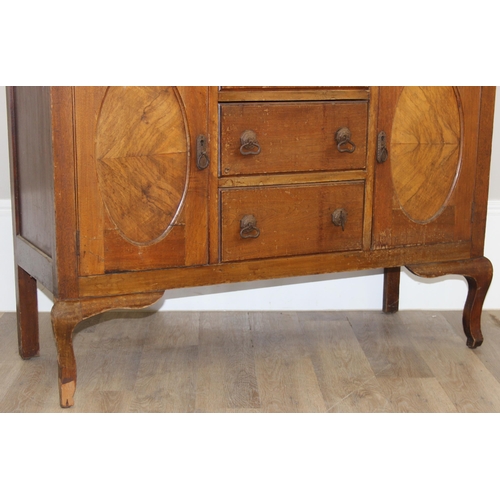 111 - A vintage oak sideboard with 3 drawers flanked by 2 cupboards, early 20th century, approx 121cm wide... 