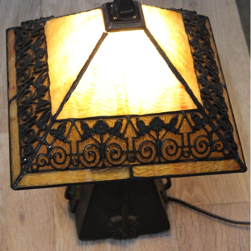 254 - An impressive Tiffany style bronze effect and slag glass table lamp, highly decorative secessionist ... 