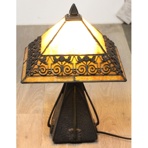 254 - An impressive Tiffany style bronze effect and slag glass table lamp, highly decorative secessionist ... 