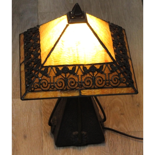 254 - An impressive Tiffany style bronze effect and slag glass table lamp, highly decorative secessionist ... 