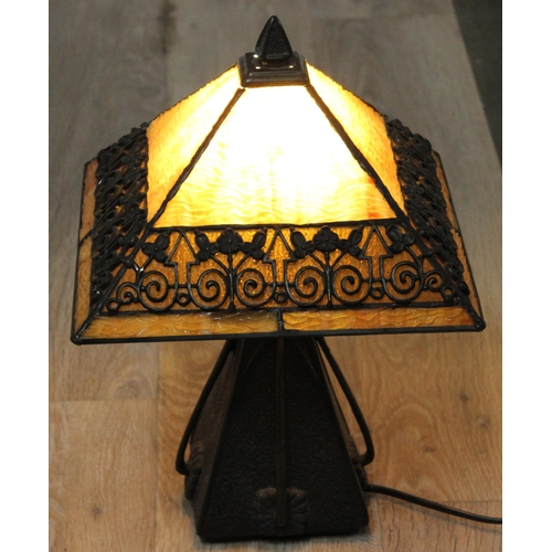 254 - An impressive Tiffany style bronze effect and slag glass table lamp, highly decorative secessionist ... 