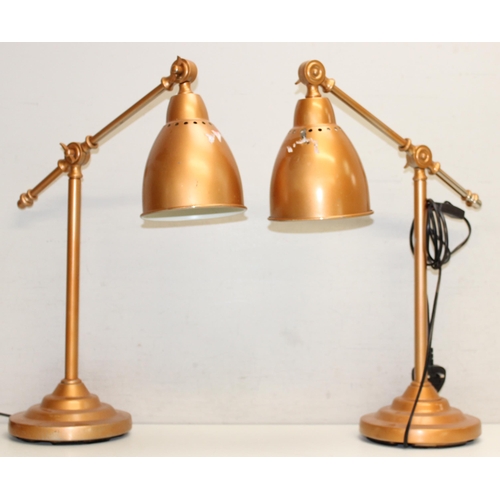 257 - A pair of gold painted industrial style Anglepoise type desk lamps, approx 54cm tall in pictured set... 