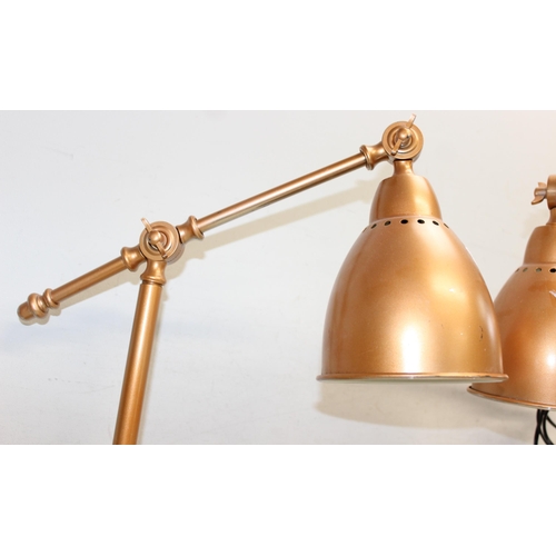 257 - A pair of gold painted industrial style Anglepoise type desk lamps, approx 54cm tall in pictured set... 