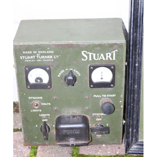 302 - A vintage Stuart Turner R2Y engine mounted on trolley with control panel and light board, on iron wh... 