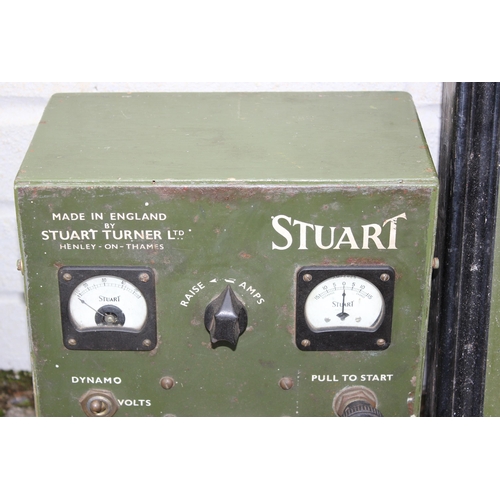 302 - A vintage Stuart Turner R2Y engine mounted on trolley with control panel and light board, on iron wh... 