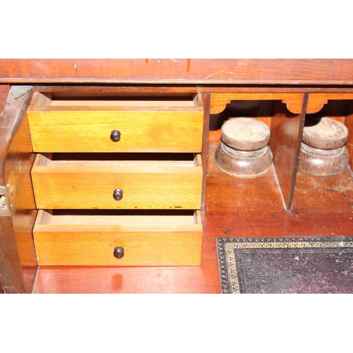 68 - A Victorian mahogany secretaire sideboard, with fitted pull out draw and leather writing top, approx... 