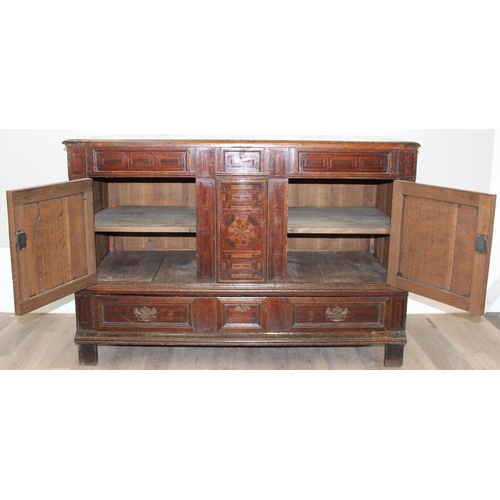 19 - An extremely unusual antique cupboard with single drawer to base and geometric parquetry design, bel... 