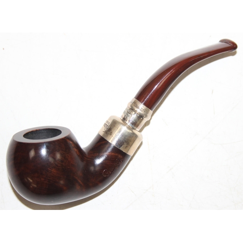 1434 - A vintage Peterson of Dublin silver mounted Ashford smoking pipe, in pouch and box, marked for Dubli... 