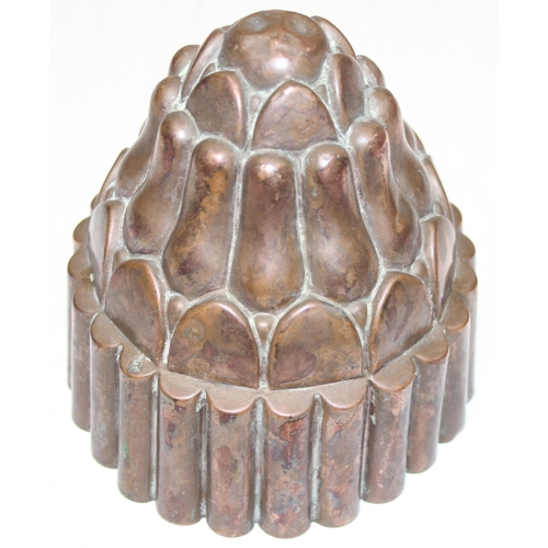 1440 - 2 antique jelly moulds, one of cylindrical form with marks for Jones Bros Down St. W, tallest approx... 