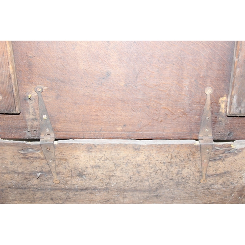 279 - An antique oak bible box with carved details and iron lock and hinges, carved details include the in... 