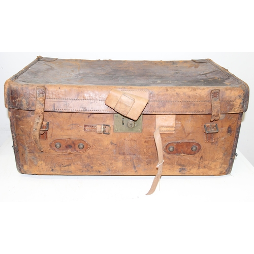 282 - Mix of large travelling cases and trunks to inc leather example, largest approx 95cm W x 51cm D x 42... 