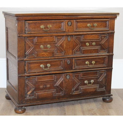 16 - A William & Mary period late 17th century oak 4 drawer chest of drawers with bun feet, later replace... 