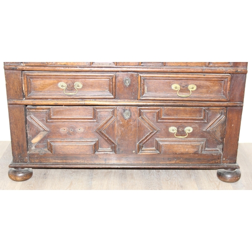 16 - A William & Mary period late 17th century oak 4 drawer chest of drawers with bun feet, later replace... 