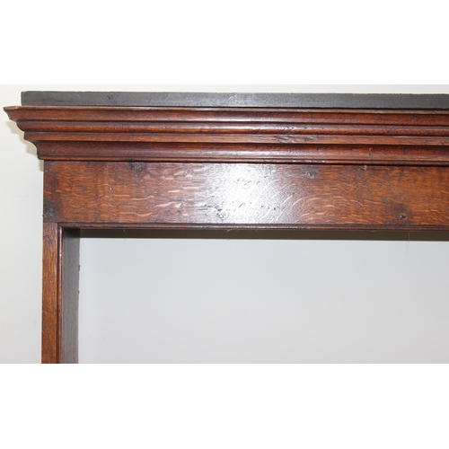 17 - A large antique country oak dresser with plate rack, likely early 19th century, the base set with 3 ... 