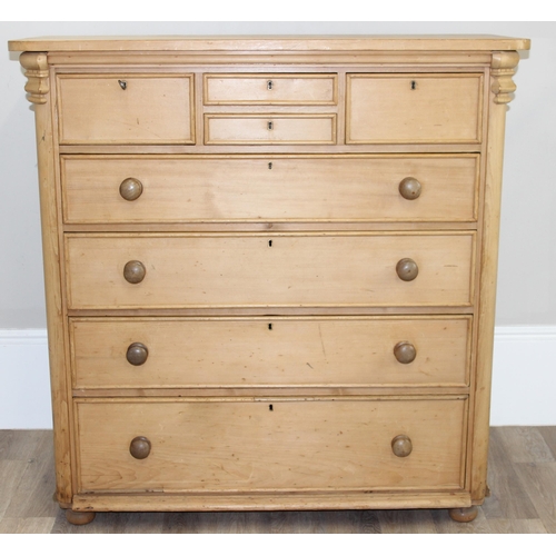 1 - An antique pine chest of drawers of unusual form, 4 smaller drawers over 4 long drawers with turned ... 