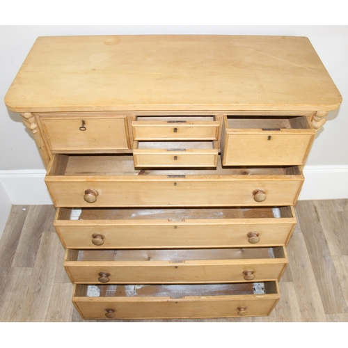 1 - An antique pine chest of drawers of unusual form, 4 smaller drawers over 4 long drawers with turned ... 