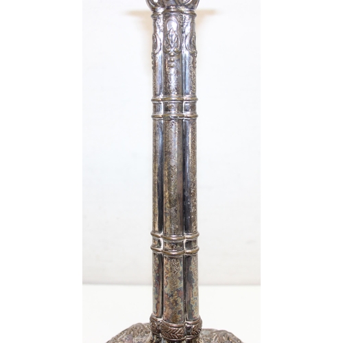 1066 - A pair of mid-18th century style silver plated candlesticks decorated with embossed acanthus scrolls... 