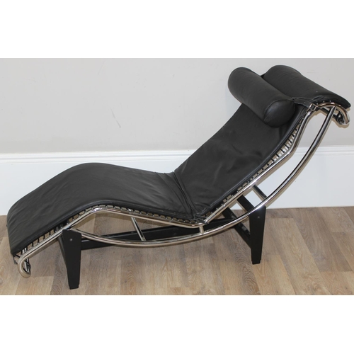 84 - In the manner of Le Corbusier, a retro LC4 style chaises longue chair or lounger made from black lea... 