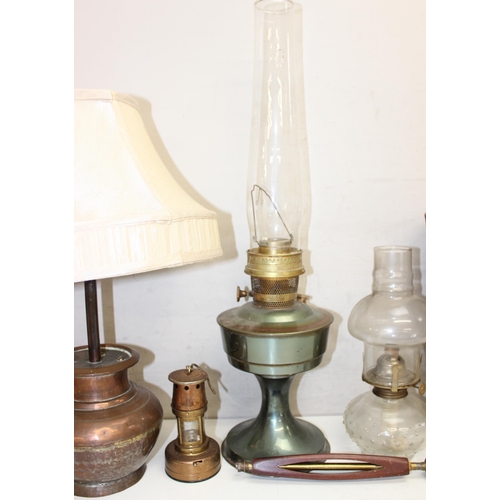 252 - Qty of lamps/lighting items to incl spirit lamps