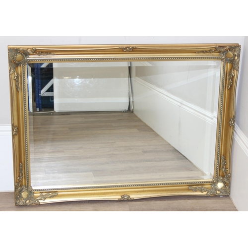 414 - An antique style gilt framed mirror, approx 106cm x 76cm