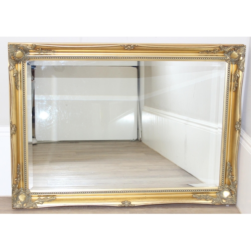 414 - An antique style gilt framed mirror, approx 106cm x 76cm