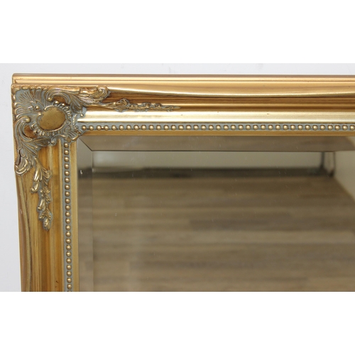 414 - An antique style gilt framed mirror, approx 106cm x 76cm