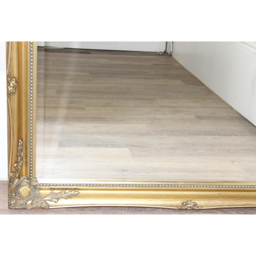 414 - An antique style gilt framed mirror, approx 106cm x 76cm