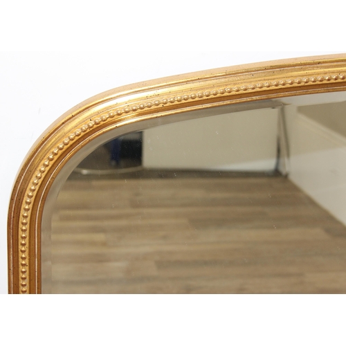 417 - An antique style gilt framed overmantel mirror, approx 142cm x 93cm