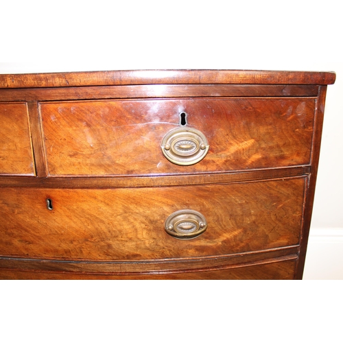 157 - A 19th century mahogany bow fronted 2 over 3 chest of drawers with brass handles and bracket feet, a... 