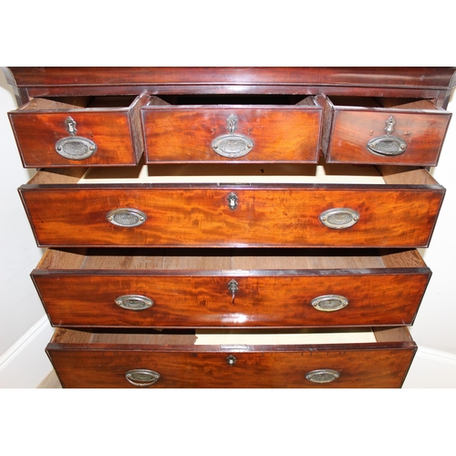 66 - A 19th century mahogany chest on chest, the top having three short and three long drawers, the base ... 