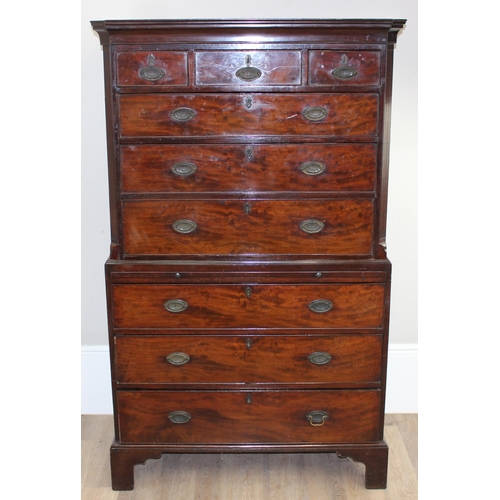 66 - A 19th century mahogany chest on chest, the top having three short and three long drawers, the base ... 