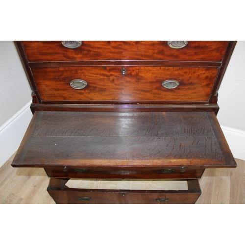 66 - A 19th century mahogany chest on chest, the top having three short and three long drawers, the base ... 