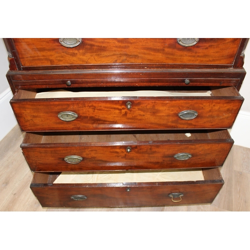 66 - A 19th century mahogany chest on chest, the top having three short and three long drawers, the base ... 