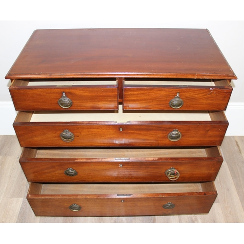 21 - A Georgian mahogany 2 over 3 chest of drawers with brass embossed ring handles and bracket feet, app... 