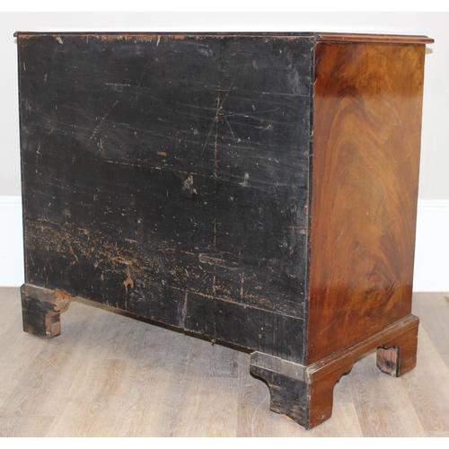 21 - A Georgian mahogany 2 over 3 chest of drawers with brass embossed ring handles and bracket feet, app... 