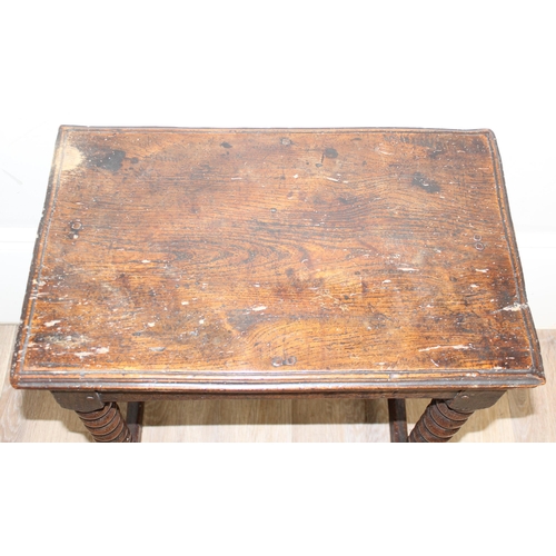 15 - A rare oak side table with bobbin-turned legs and peg construction, believed to be Charles II period... 