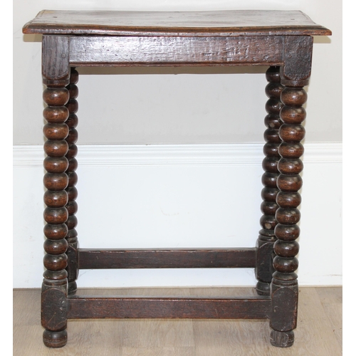 15 - A rare oak side table with bobbin-turned legs and peg construction, believed to be Charles II period... 