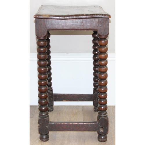 15 - A rare oak side table with bobbin-turned legs and peg construction, believed to be Charles II period... 