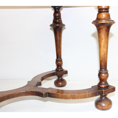 152 - A William & Mary style low table with quarter cut burr walnut veneer, X-form stretcher with piecrust... 