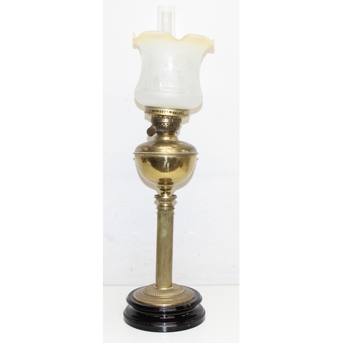 265 - 4 various oil lamps to include 2 with acid etched art nouveau glass shades, and 2 further spare glas... 