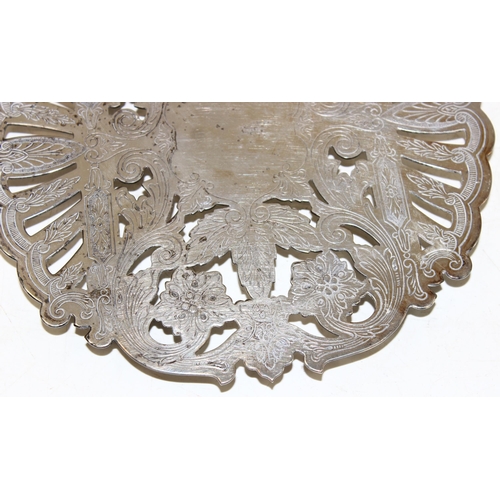 1096 - An impressive antique silver plated trivet with pierced and engraved decoration by Wallace, an antiq... 